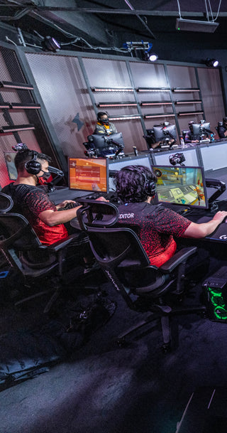 Group of gamers in lan center in Mavix chairs